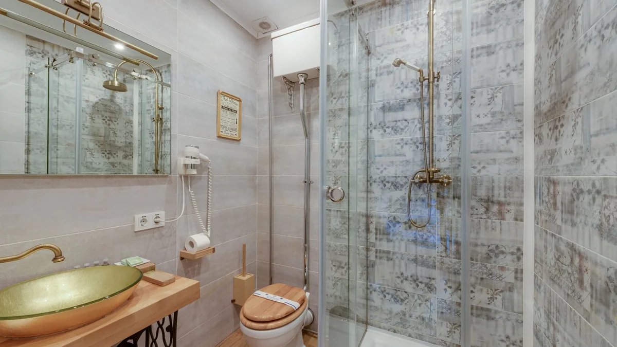 Rebuilt tile shower with glass door in Fremont, CA